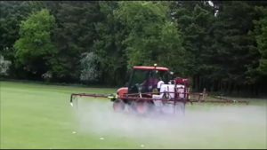spraying a golf course