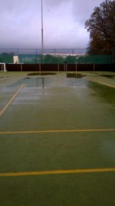 waterlogged synthetic sports pitch